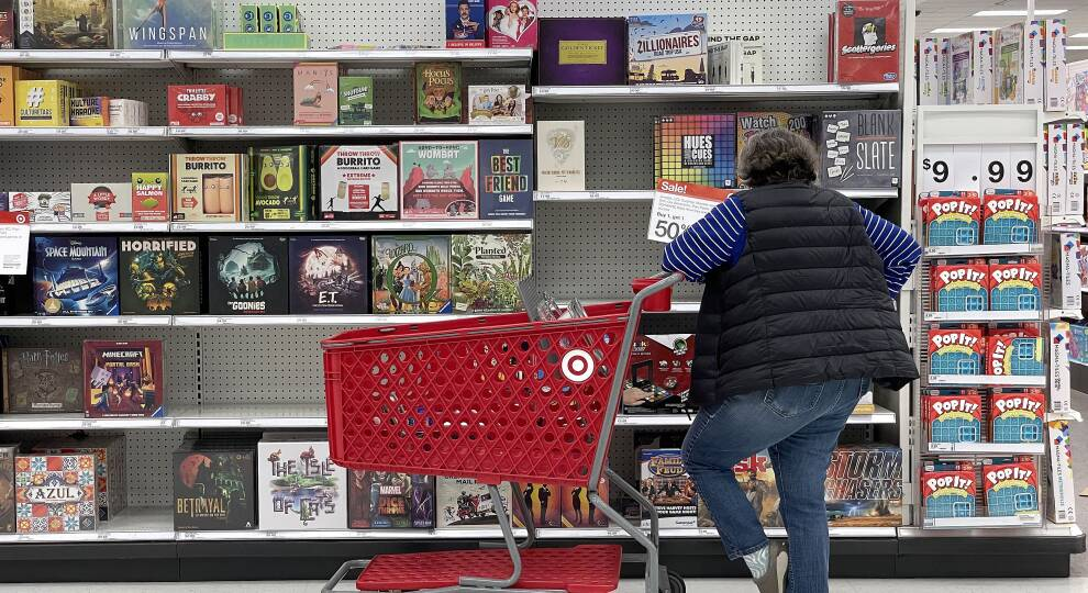 Man at shopping isle, looking for products, Retail trends